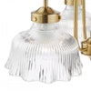 Hanging lights with natural brass finish and elegant glass design