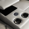 Spacious corner suite in charcoal leather for sophisticated interiors.
