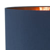 Modern lighting solution with navy shade and glass base