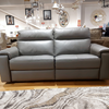 Modern showroom featuring the Nicoletti Home Syracuse 3 seater leather recliner sofa.
