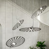 Sophisticated Sollux Lighting Pendant Lamp LEHDET Black in an open space.
