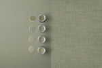 High-quality Graham & Brown wallcovering with a rustic green weave

