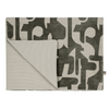 Soft and stylish Scatterbox Soren Throw in green for your couch.
