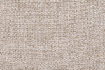 Trendy upholstered chair in natural tone, adding sophistication.