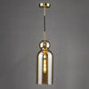 Luxurious Tao Pendant Brushed Bronze and Amber Glass in a modern setting