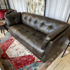 modern 3 seater leather sofa with hand-tufted detailing
