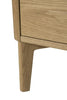Keep your essentials within reach with this bed side table
