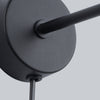 Versatile SUBA Black wall light complementing modern interiors.
