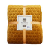 Elevate your decor with the subtle geometric design throw.