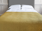 Add texture and style to your space with this stylish quilted throw.