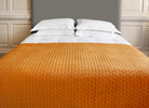 Cozy bed throw in pumpkin