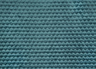 Elegant Scatterbox Halo Throw in Teal adds charm to your couch.