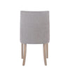 A full back view of the Rosa Sand Linen Dining Chair, displaying its elegant design and sturdy construction.