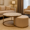 Modern living room with beige sofa, armchair, and coffee table.
