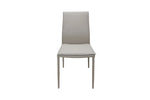  Experience luxury and comfort with the Talia Dining Chair in Mocha. The chair's rich mocha upholstery adds a touch of elegance to your dining area, while its high-quality construction ensures durability and longevity. The curved backrest and padded seat offer exceptional support, allowing you to sit comfortably during meals and gatherings. 