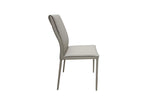 Create a cozy and inviting dining area with the Talia Dining Chair in Mocha. The chair's mocha-colored upholstery brings a warm and earthy tone to your space, adding a sense of comfort and relaxation. Its ergonomic design and cushioned seat provide a comfortable seating experience, making it an ideal choice for long dinners and entertaining guests. 