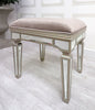 Experience luxury and comfort with the Jessica Dressing Table Stool. Its cushioned seat, upholstered in a high-quality fabric, offers a soft and supportive surface for getting ready in the morning or evening.